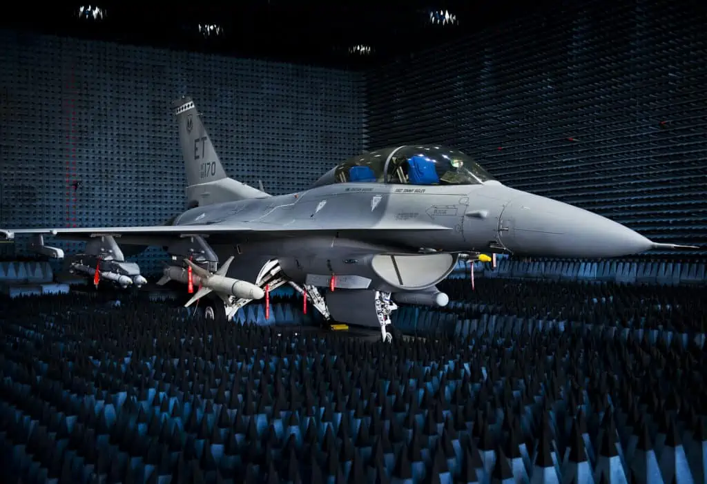 A 40th Flight Test Squadron F-16 Fighting Falcon sits in the anechoic chamber after completion of the initial round of testing simulations on the new M-7 software upgrade Oct. 30, 2014, at Eglin Air Force Base, Fla. The M-7 software package will provide multiple advanced capabilities to the aircraft. The anechoic chamber is a room designed to stop reflections of either sound or electromagnetic waves. The room is insulated from exterior sources of noise. The room is part of a facility that allows testing of air-to-air and air-to-surface munitions and electronics systems on full-scale aircraft and land vehicles prior to open-air testing. (U.S. Air Force photo/Samuel King Jr.)