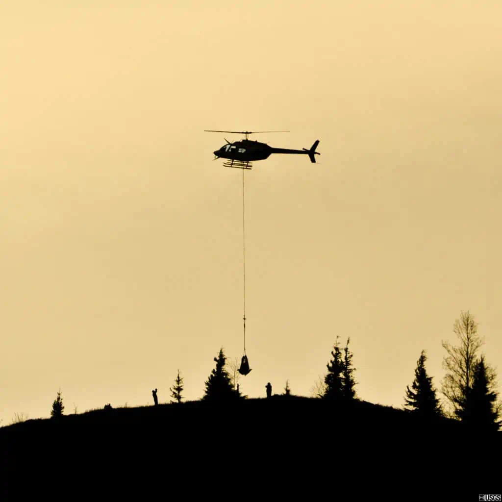 Photo: USGS Delivery of Sensor by Helicopter